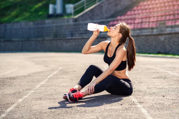 Woman Runner with Sports Bottle