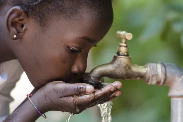 Drinking Water Is Hard Image of Young Girl Drinking From Faucet